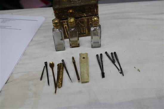An early 19th century French gilt brass necessaire, 4.5in.
